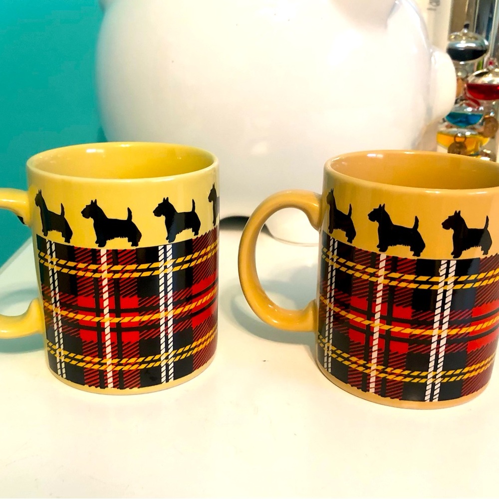 Two Scottie dogs with his tartan vintage Scottish mugs